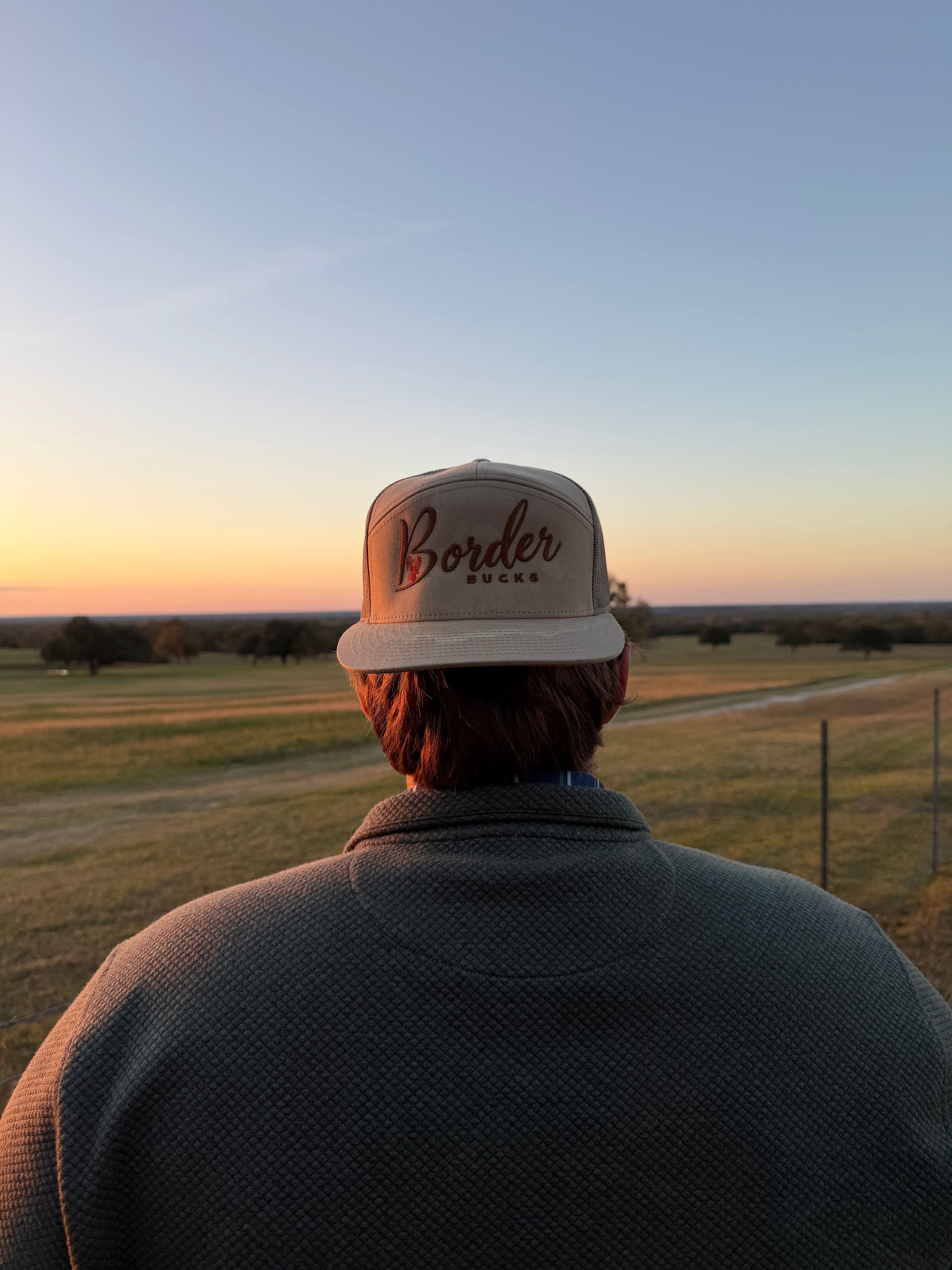 Flat bill trucker hat